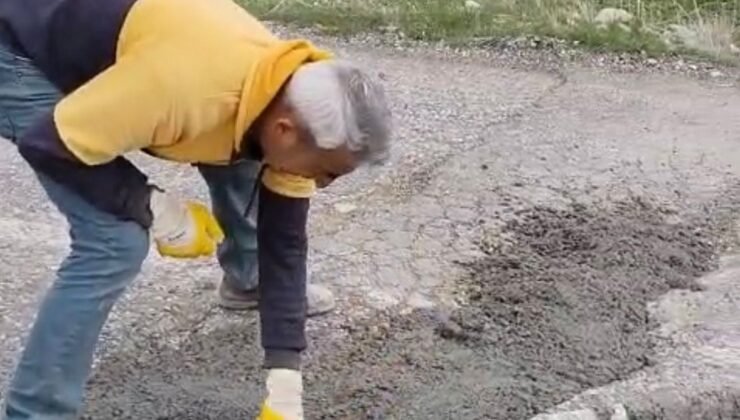 Tomarza’da mahalleli bozuk yolu betonla onardı